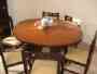 VENDO JUEGO DE MESA Y 6 SILLAS DE MADERA