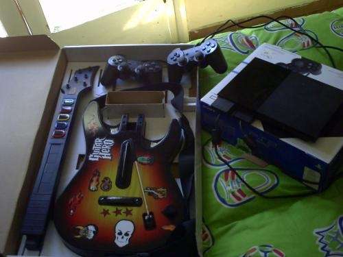 Playstation2 sony+2 joystick sony+guitar hero+juegos