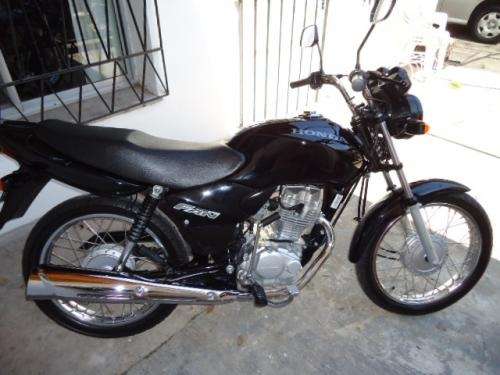 Honda cg 125 fan - 2009 - 7300 km - alarma c/presencia