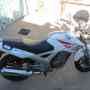 moto  honda twister 250 año 2011. color blanco .23  kilometros